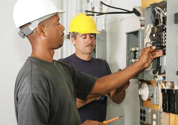 two-electricians-working