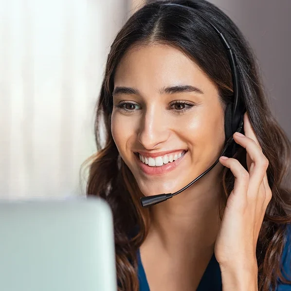 bigstock-Smiling-woman-using-laptop-whi-299113399